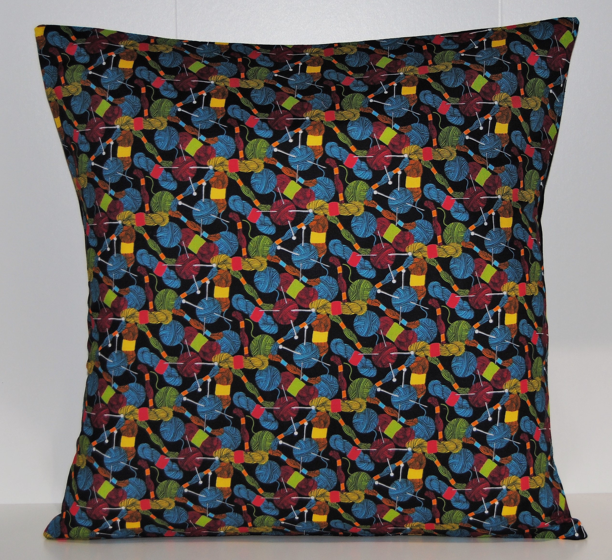 Knitting themed cushion